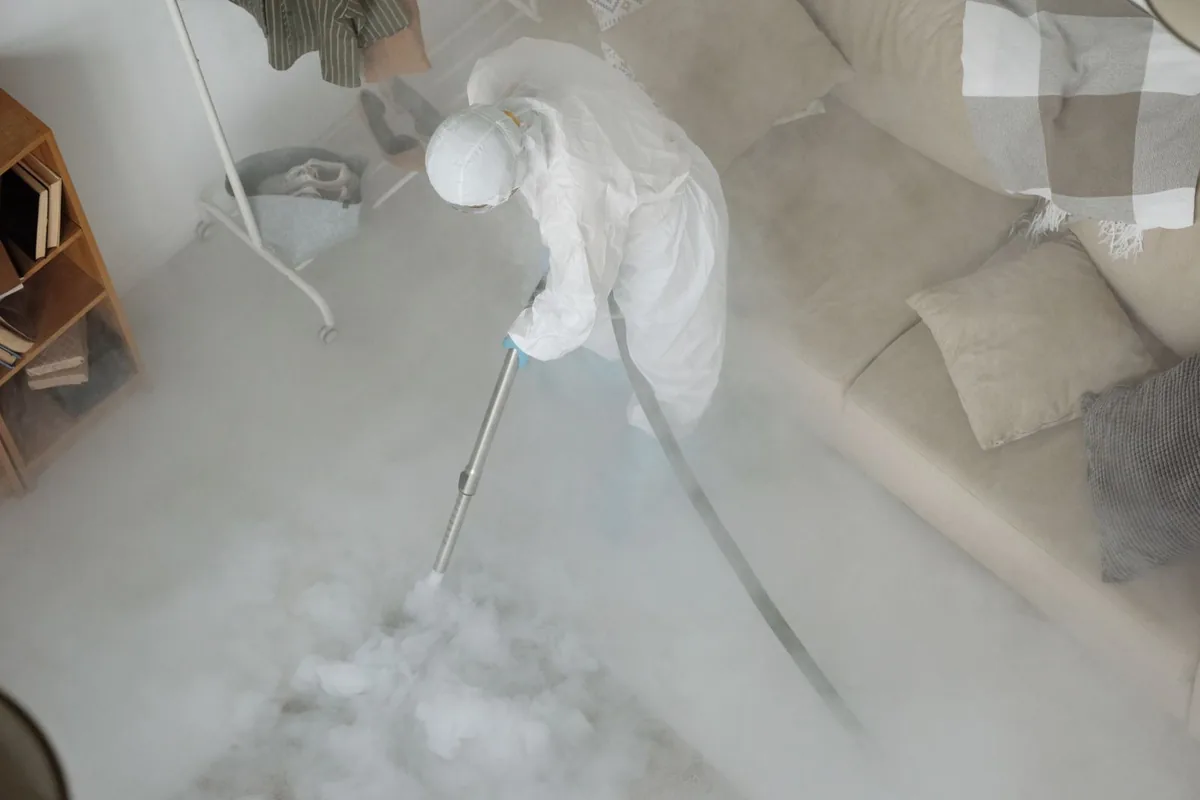 Biohazard cleanup technician in protective equipment, Yorktown Heights, NY